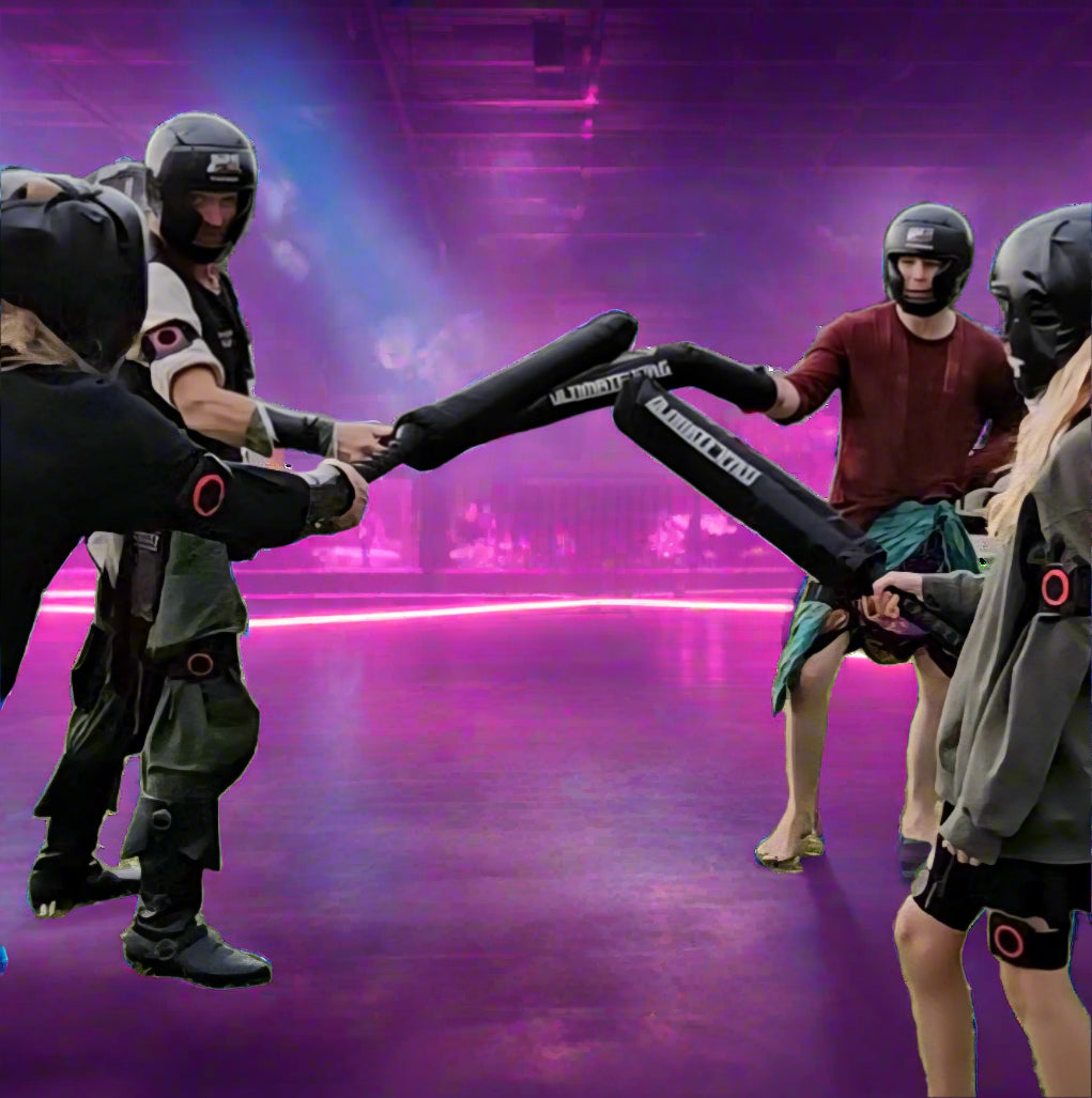 Group of UltimateTag players in protective gear wielding swords in a cybrerpunk arena about to dual